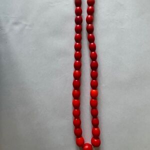 Red trade bead necklace with cotton tie clasp